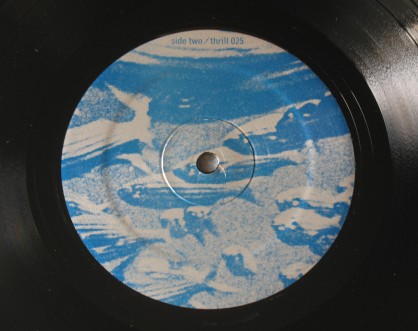 Tortoise  - Millions  Now Living Will Never Die vinyl - Side 2 label.  Photo by Hans Morgenstern.